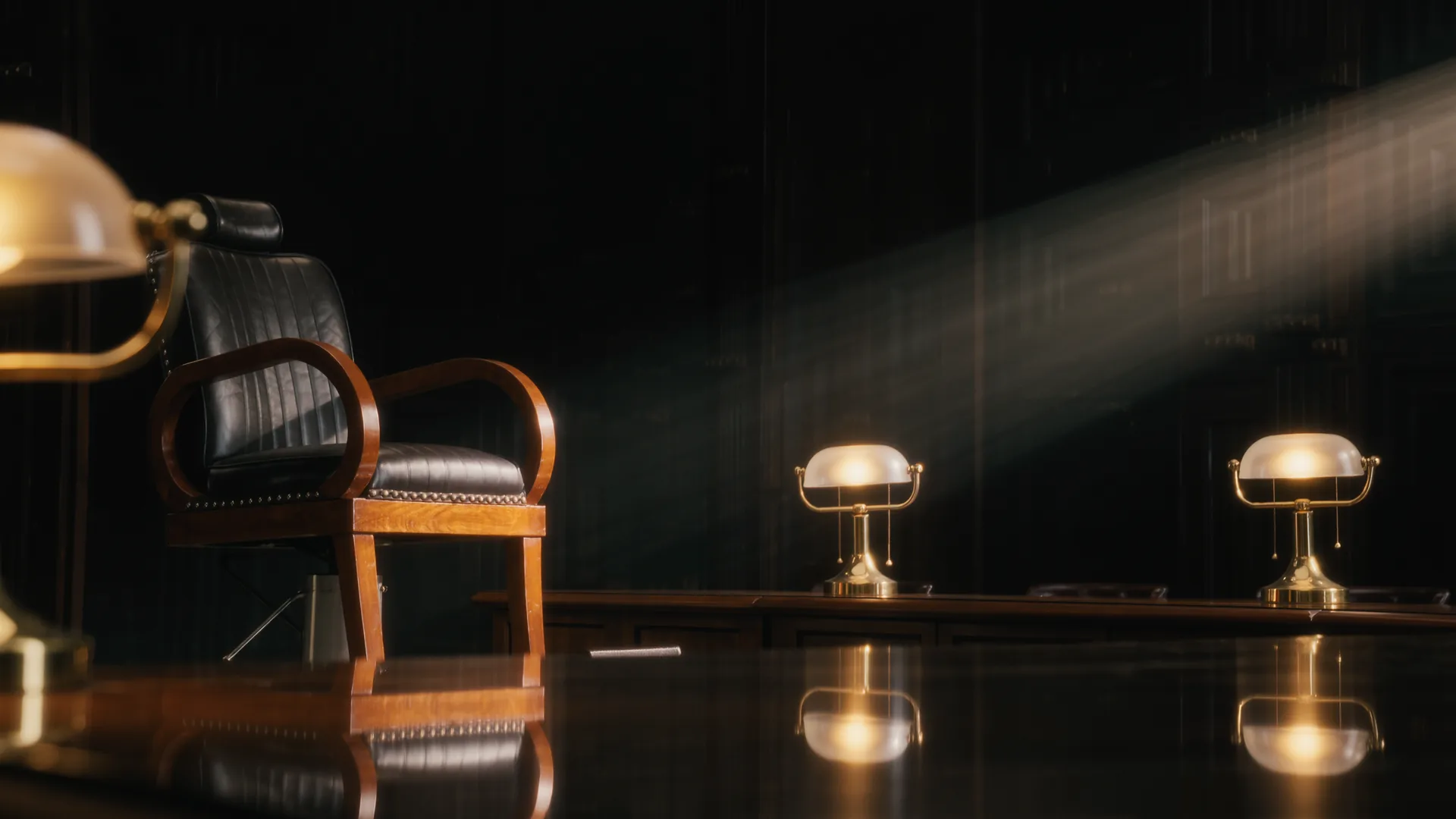 Classic barbershop interior in dark wood and brass with a leather chair