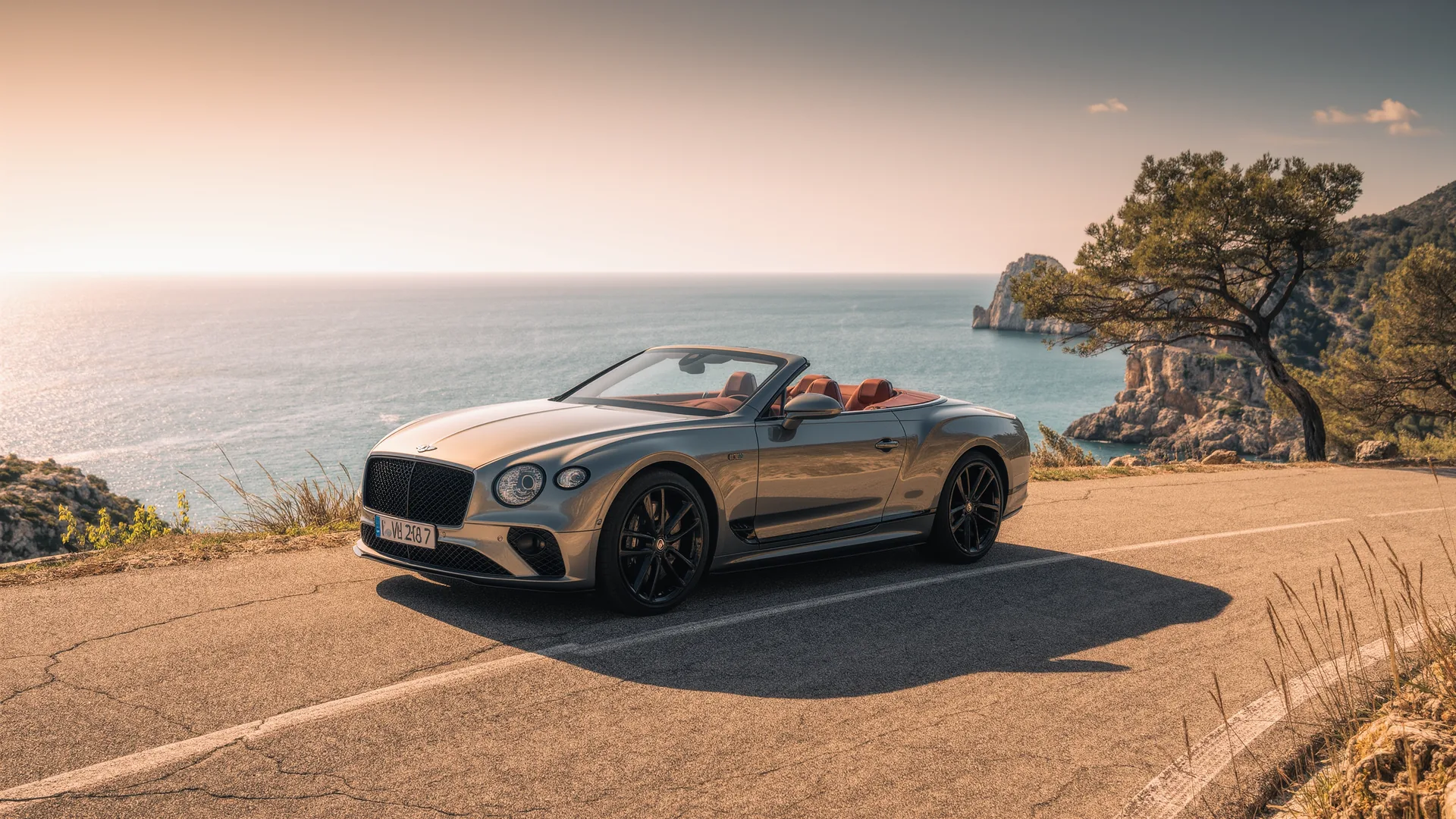 Convertible parked on a coastal road above the sea in Mallorca