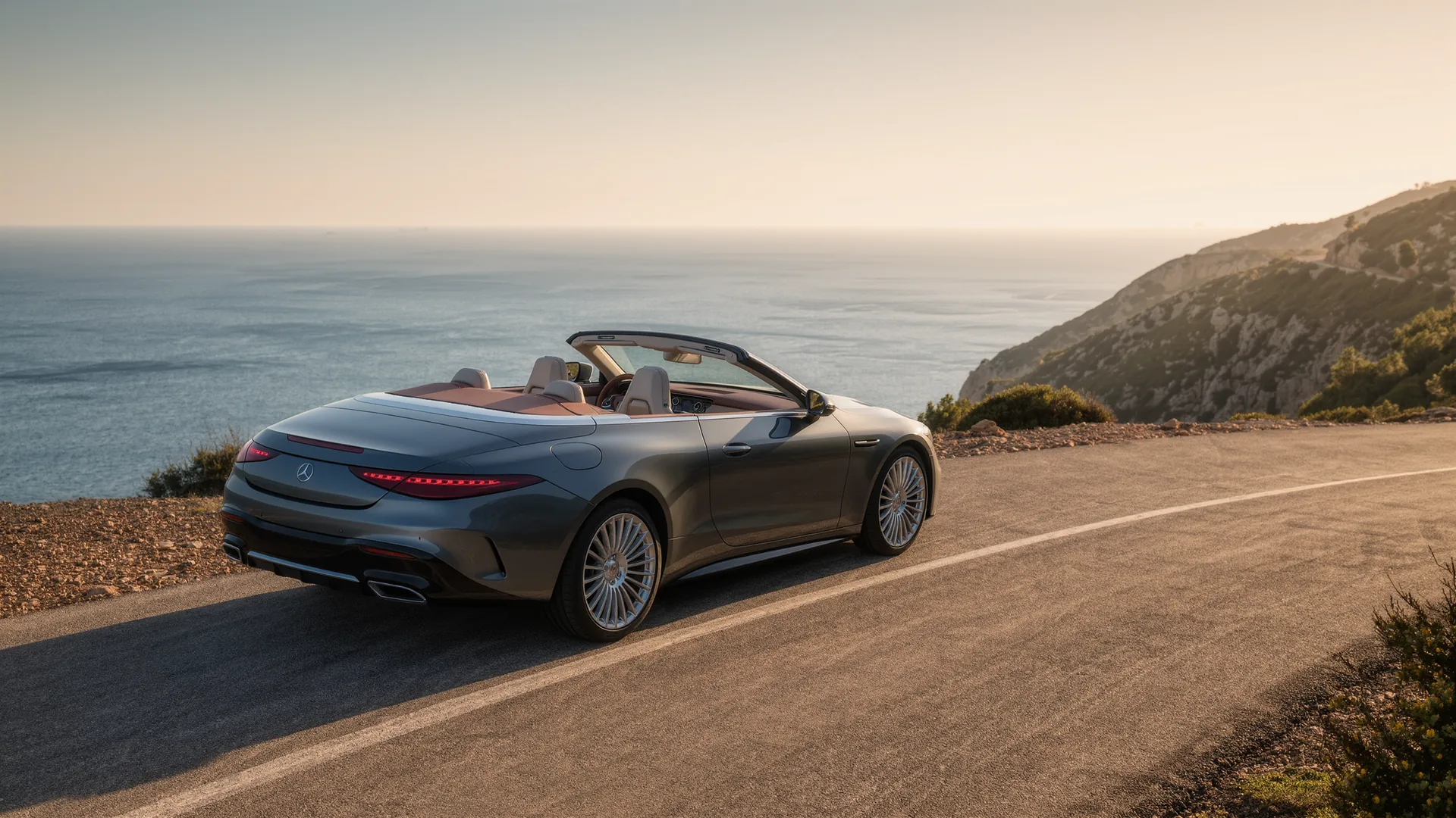 Convertible parked on a coastal road above the sea in Mallorca