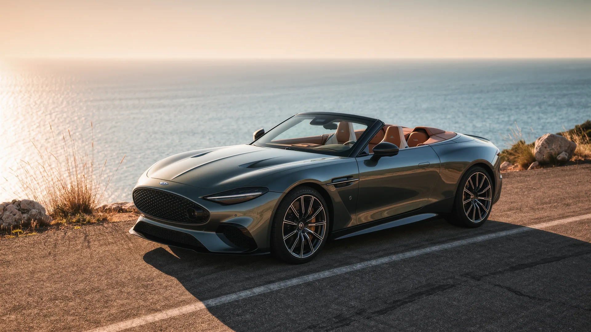 Convertible parked on a coastal road above the sea in Mallorca