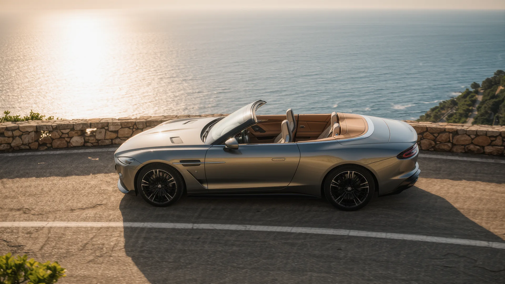Convertible parked on a coastal road above the sea in Mallorca