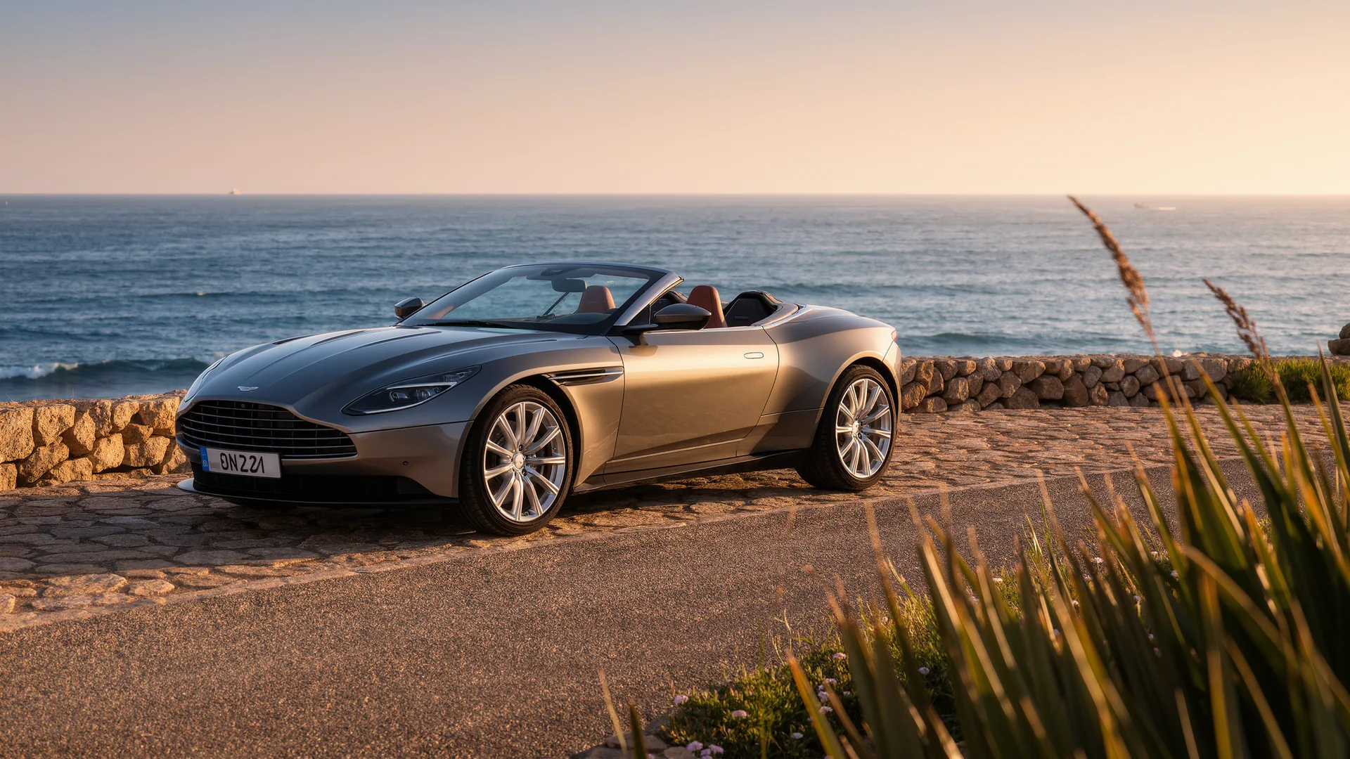 Convertible parked on a coastal road above the sea in Mallorca